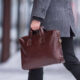 brown leather briefcase or black